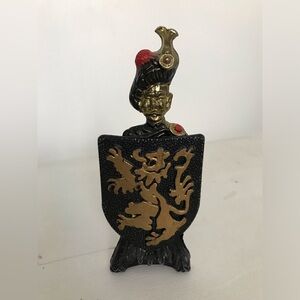 Vintage cast iron Scotsman bottle opener with stand 1960s